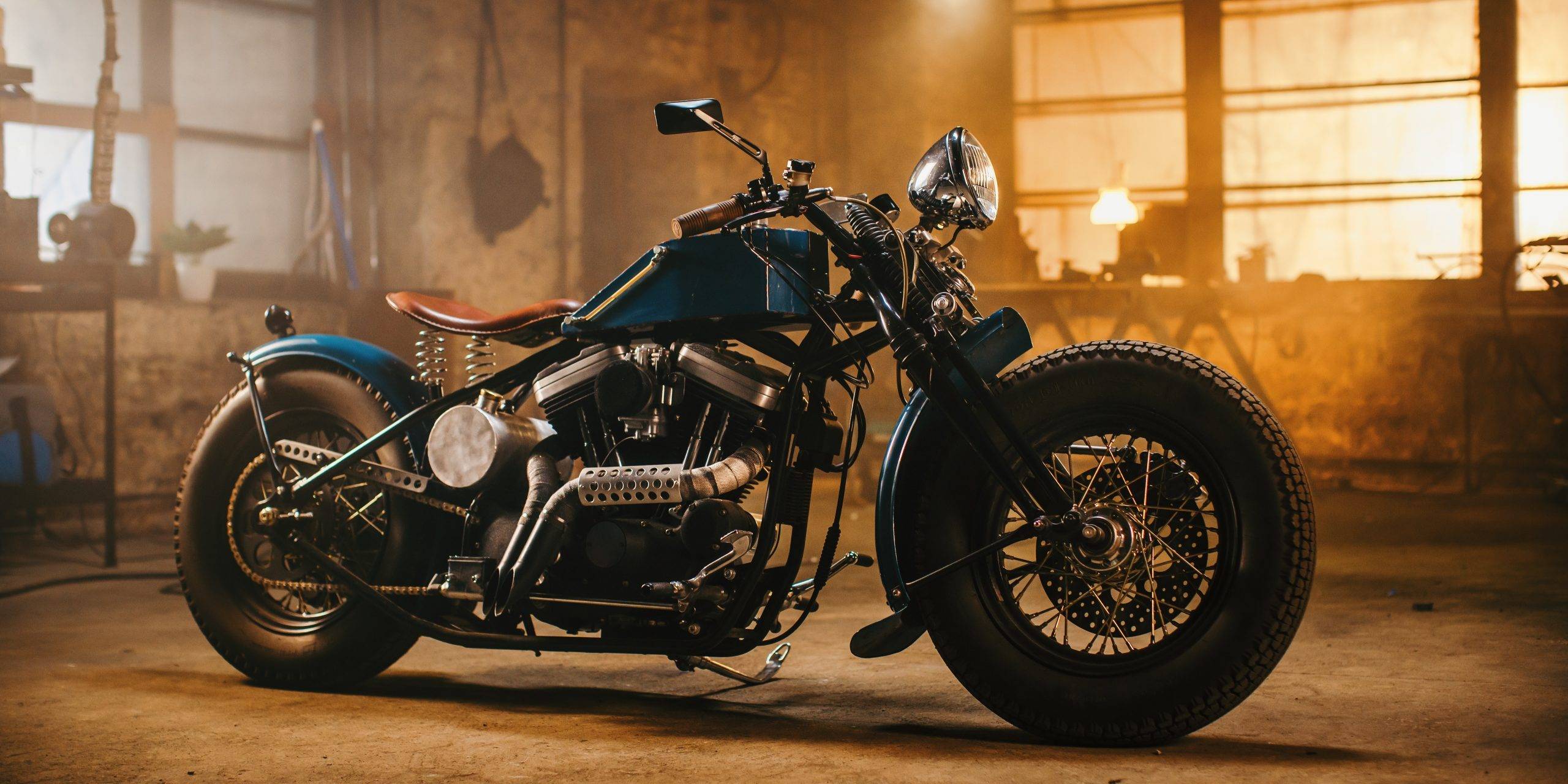 Custom Bobber Motorbike Standing In An Authentic Creative Worksh